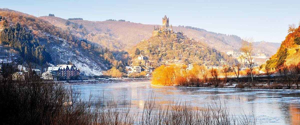A view down the river towards Cochem with a light dusting of winter snow, Germany
